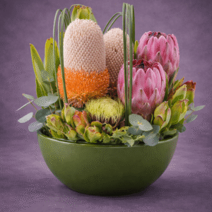 Exotic Floral Arrangement in Green Bowl